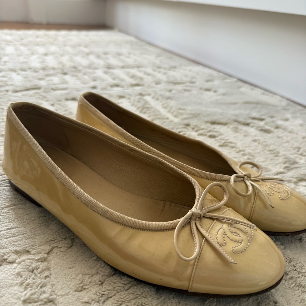 CHANEL Gold Ballet Flats with Bow Detail